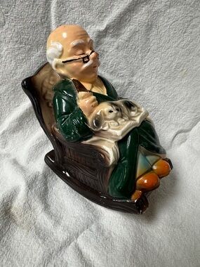 Ceramic Coin Bank Figurine of Elderly Man in Rocking Chair - Green